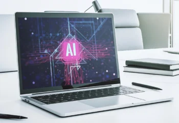 AI Web Development illustration showing a computer, robot assistant, and code elements representing artificial intelligence in website design