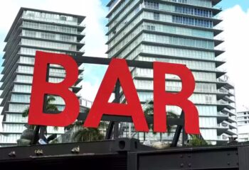 Red BAR sign with Orlando cityscape – modern design and urban vibes.